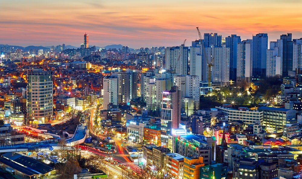 Paint By Numbers | Aerial Photography Of Lighted City High Rise Buildings During Dawn