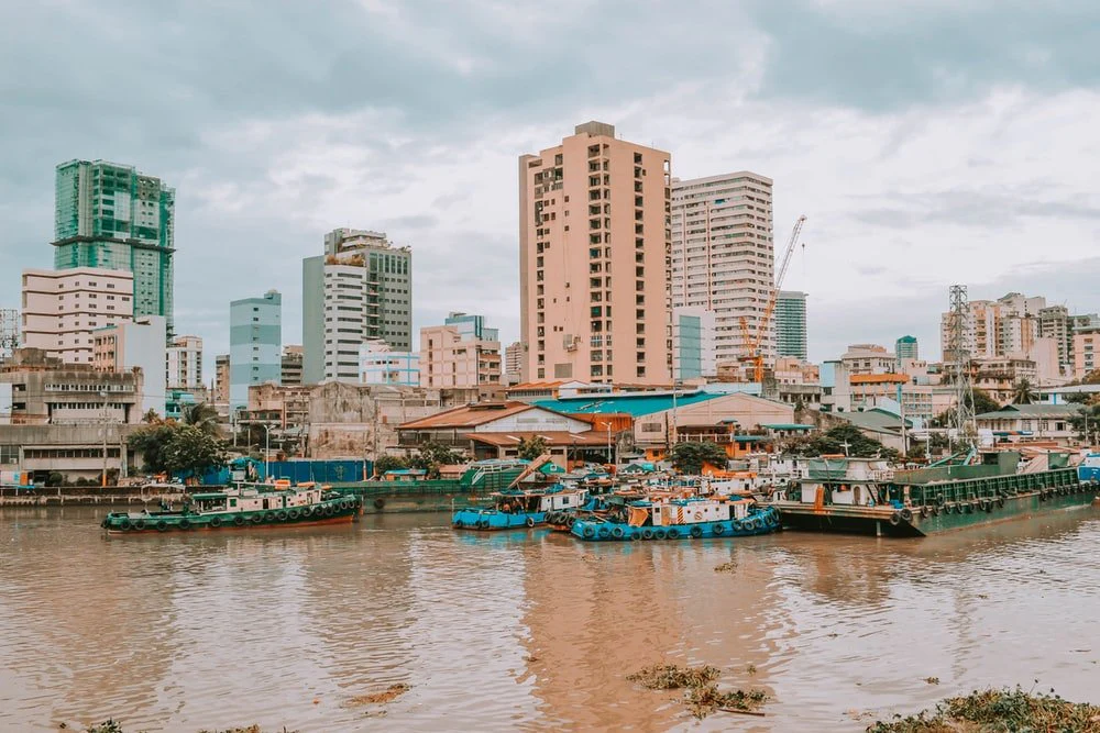 Paint By Numbers | Blue And White Boat On Water Near City Buildings During Daytime