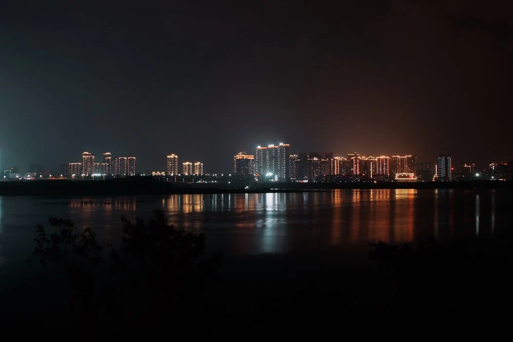Paint By Numbers | Nanchong - Body Of Water Across City Building Photo During Nighttime