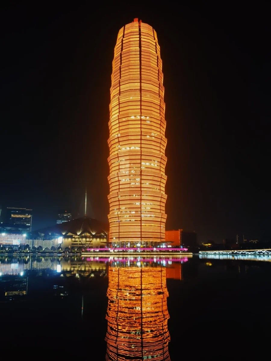 Paint By Numbers | Zhengzhou - Brown High Rise Building Near Body Of Water During Night Time
