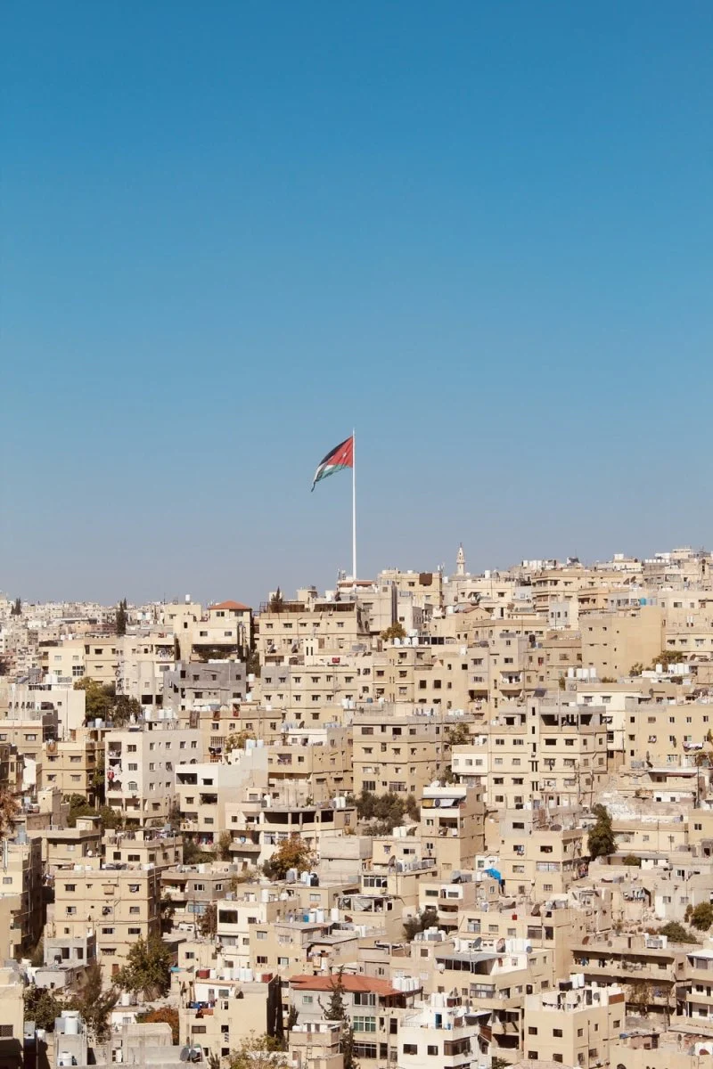 Paint By Numbers | Amman - Brown Houses With Red And Blue Flag Waving On Pole