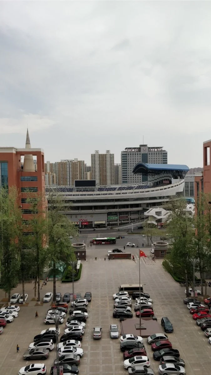 Paint By Numbers | Zhongshan - Cars Parked On Parking Lot Near High Rise Buildings During Daytime