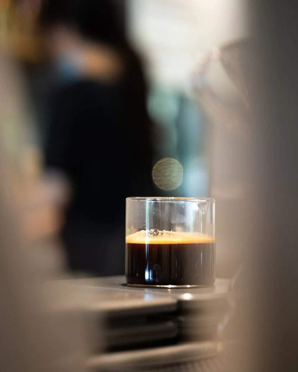Paint By Numbers | Dongguan - Clear Drinking Glass With Black Liquid On Table