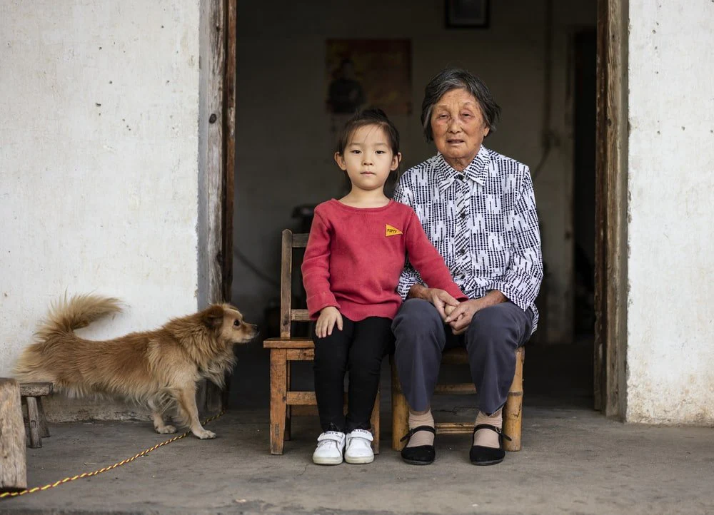 Paint By Numbers | Anqing - Girl And Woman Sitting Near Brown Dog