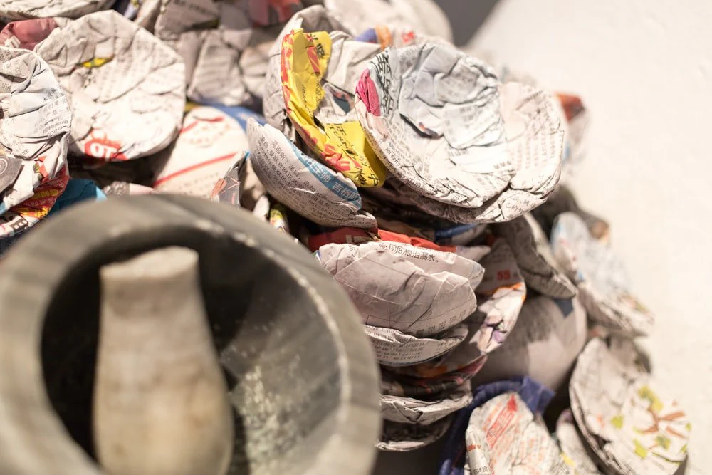 Paint By Numbers | Kunming - Gray And Black Hat On Black Round Container