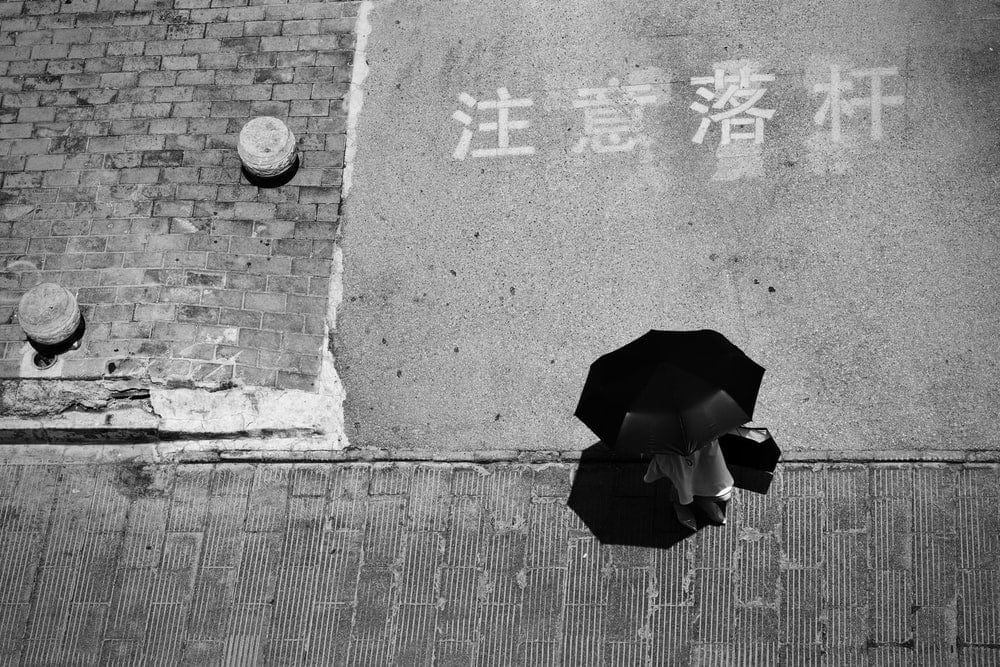 Paint By Numbers | Xi’An - Grayscale Photo Of Person Holding Umbrella
