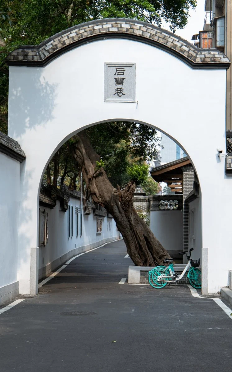 Paint By Numbers | Fuzhou - Green And White Bicycle Parked Beside White Concrete Building During Daytime