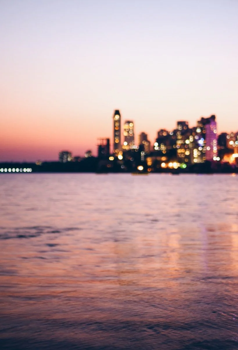 Paint By Numbers | Landscape Photography Of Lighted Buildings Beside Body Of Water