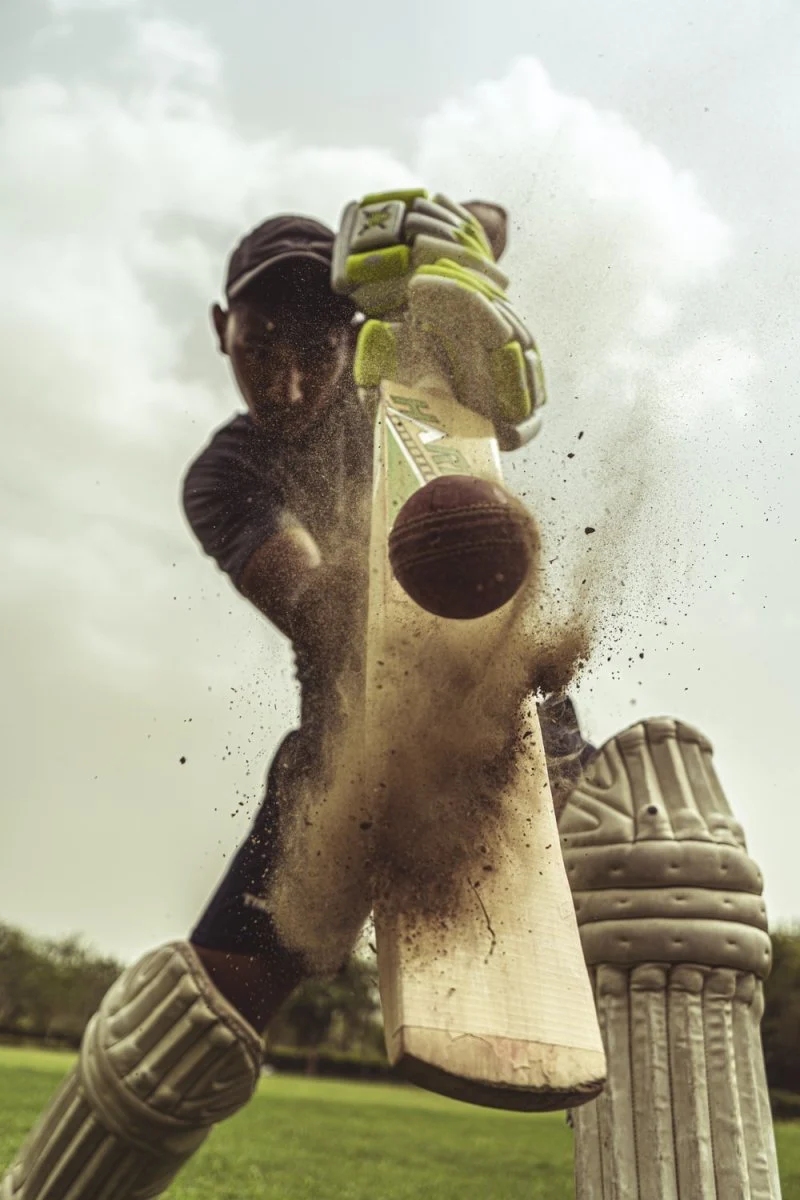 Paint By Numbers | Cricket - Man In Black Jacket Holding Yellow And Green Plastic Bottle