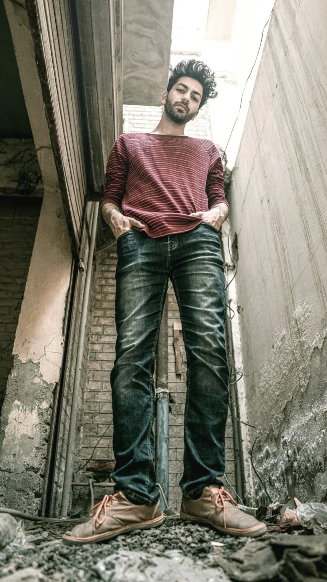 Paint By Numbers | Faisalabad - Man In Red And White Striped Shirt And Blue Denim Jeans Standing On Stairs