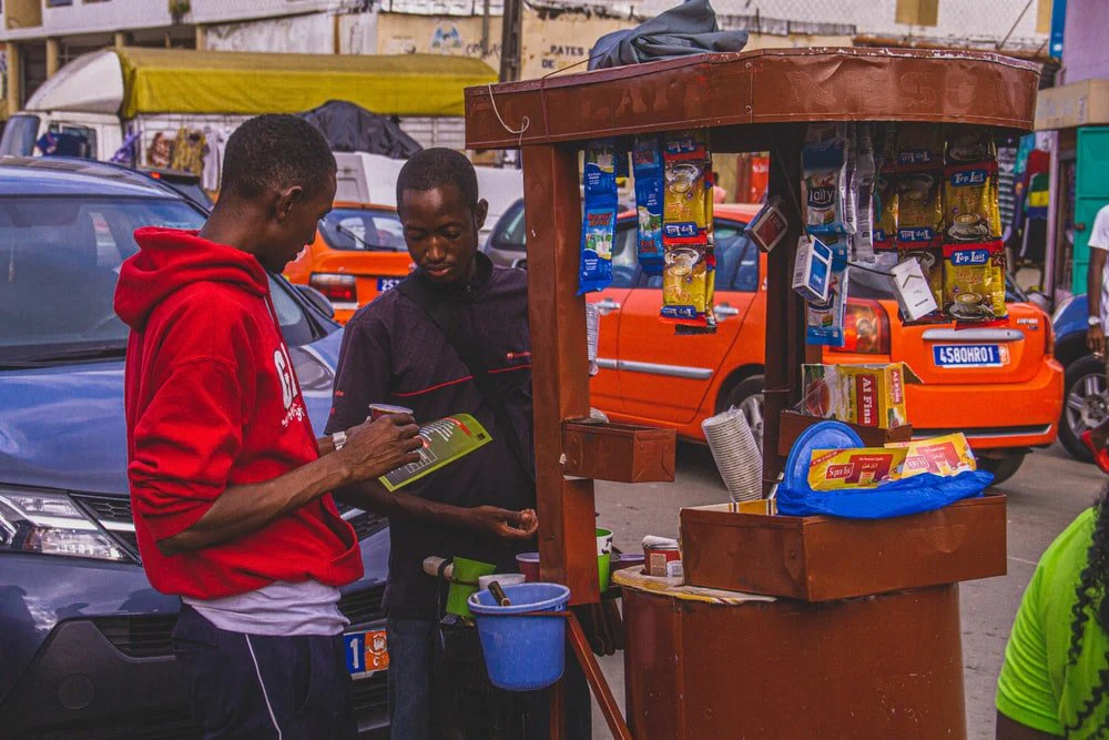 Paint By Numbers | Abidjan - Man In Red Polo Shirt Holding Yellow Banana
