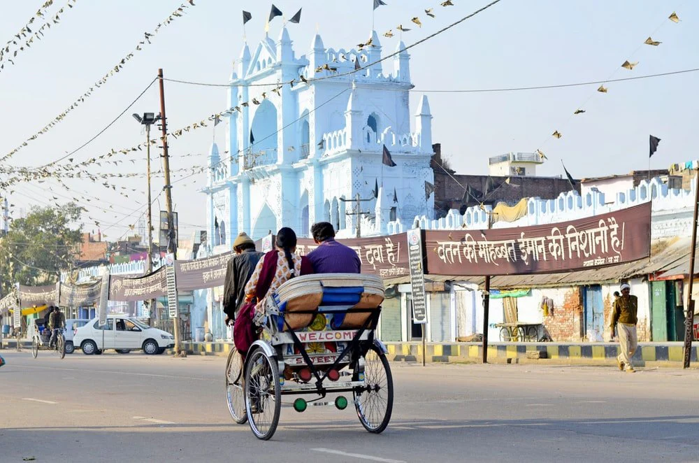Paint By Numbers | Lucknow - Man In Red Shirt Sitting On Red And Black Wheelchair On Road During Daytime