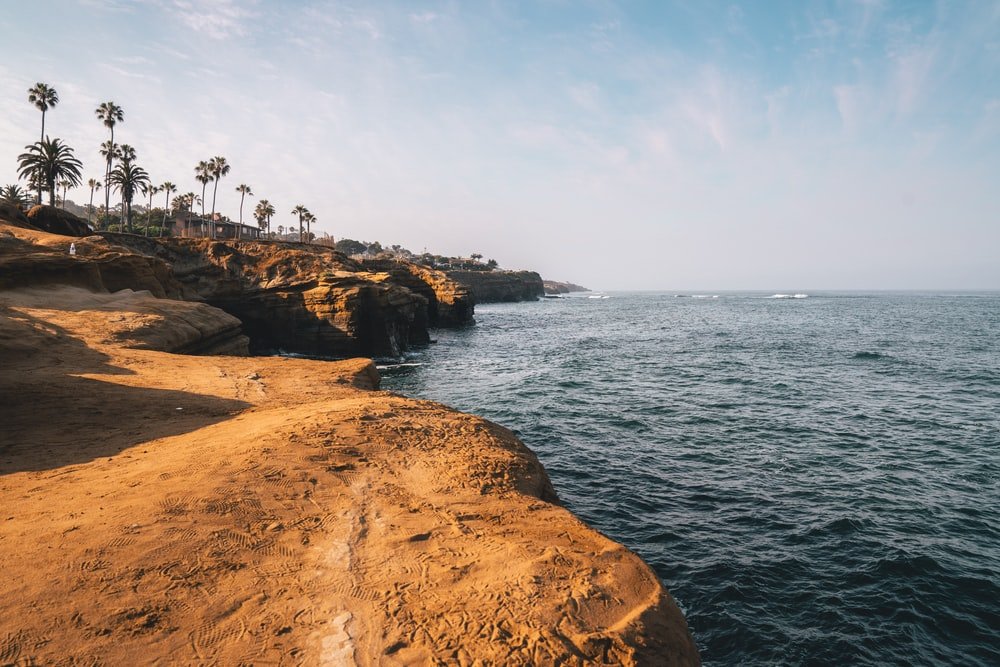 Paint By Numbers | San Diego - People On Brown Rock Formation Near Body Of Water During Daytime