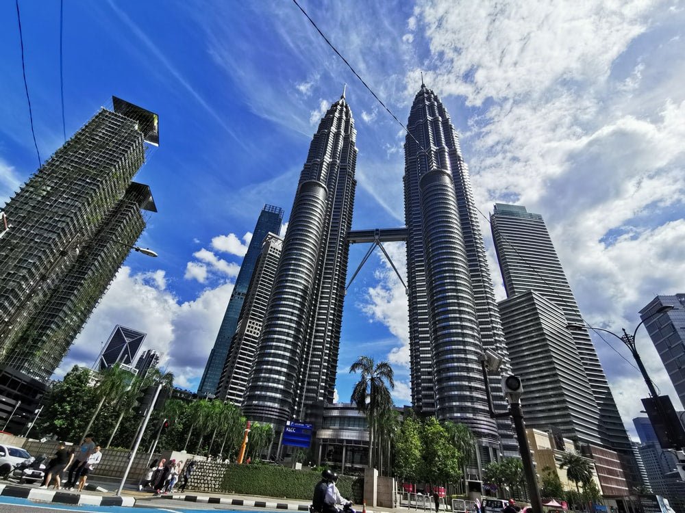 Paint By Numbers | Kuala Lumpur - People Walking On Street Near High Rise Buildings During Daytime