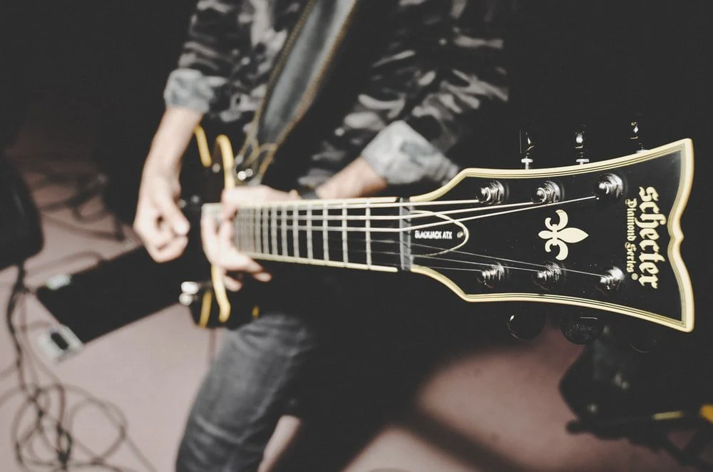 Paint By Numbers | Bass - Person Playing Electric Guitar In Black And White Long Sleeve Shirt