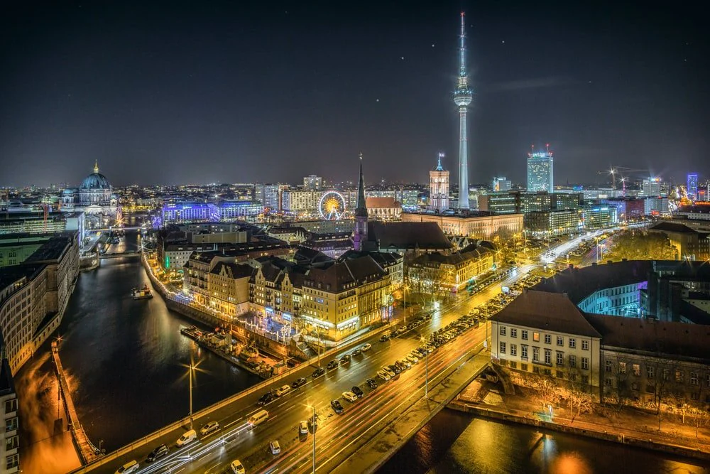 Paint By Numbers | Berlin - Time-Lapse Photography Of Vehicle At The Road In Between The Building At Nighttime Aerial Photography
