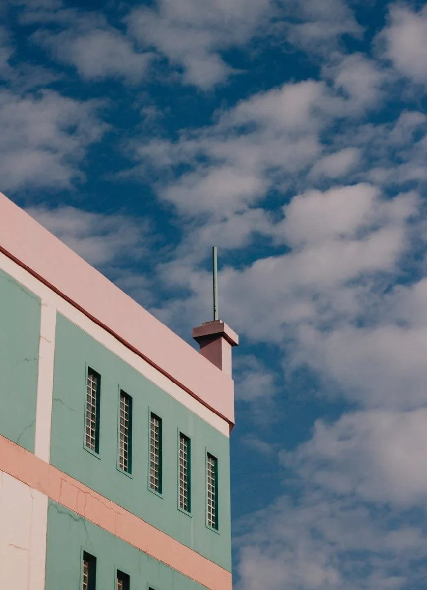 Paint By Numbers | Surabaya - White And Pink Concrete Building Under Blue Sky During Daytime