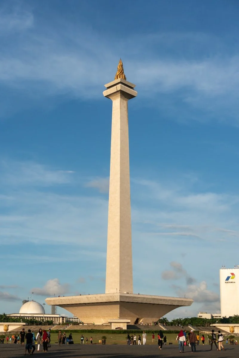 Paint By Numbers | Jakarta - White Concrete Tower Under Blue Sky During Daytime