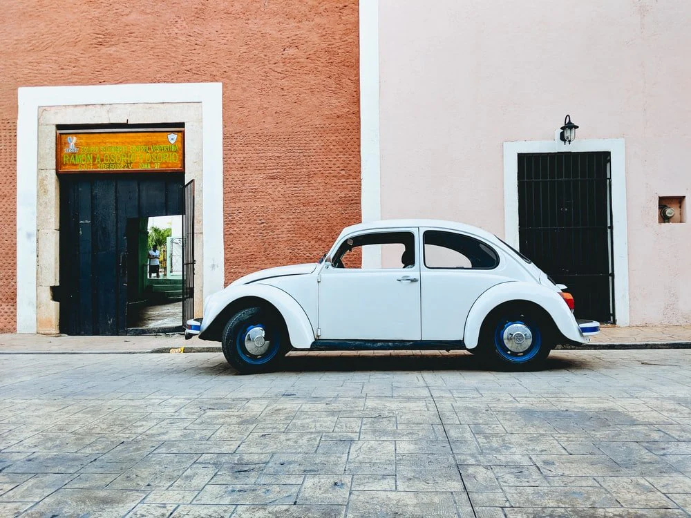 Paint By Numbers | Beetle - White Volkswagen Beetle Parked Near Building During Daytime