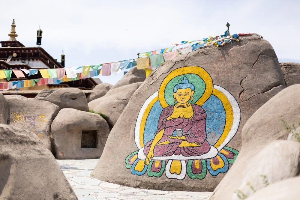 Paint By Numbers | Chaoyang - Woman In Blue Dress Standing On Brown Rock