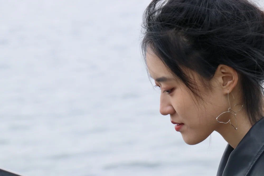 Paint By Numbers | Jinan - Woman In White Shirt Looking At The Sea During Daytime